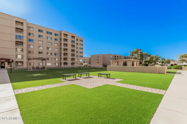 a view of a big building with a big yard