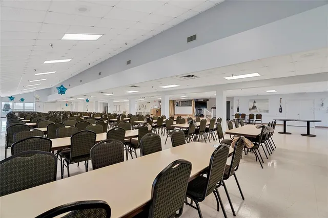 a group of people sitting in a living room