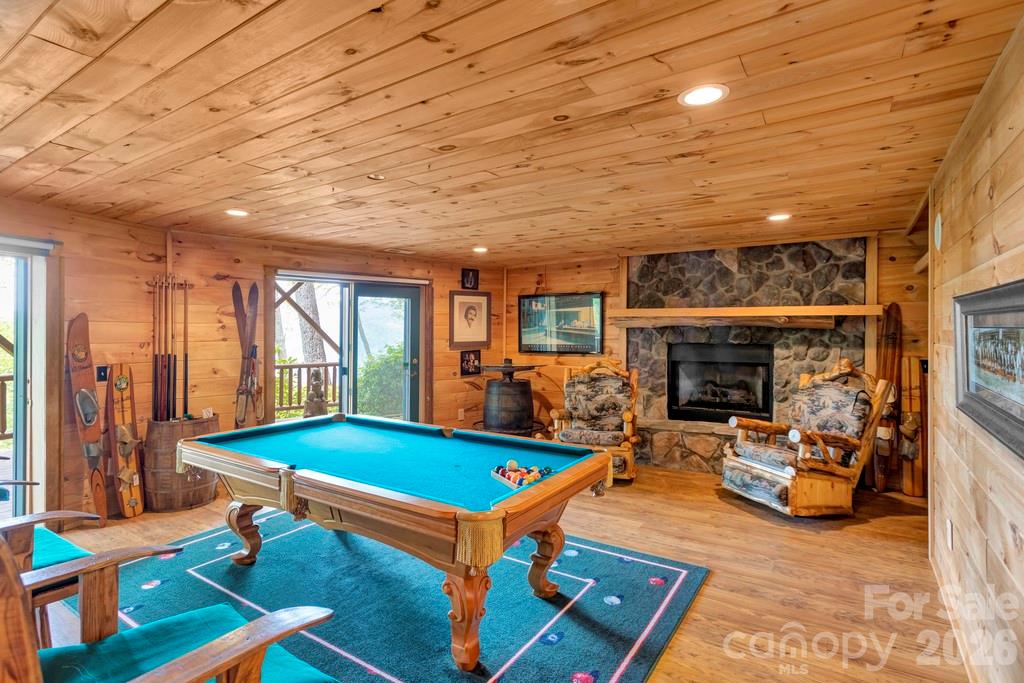 35 Falcon Crest Loop Maggie Valley, NC 28751 - Photo 28 of 46 a room with pool table and windows