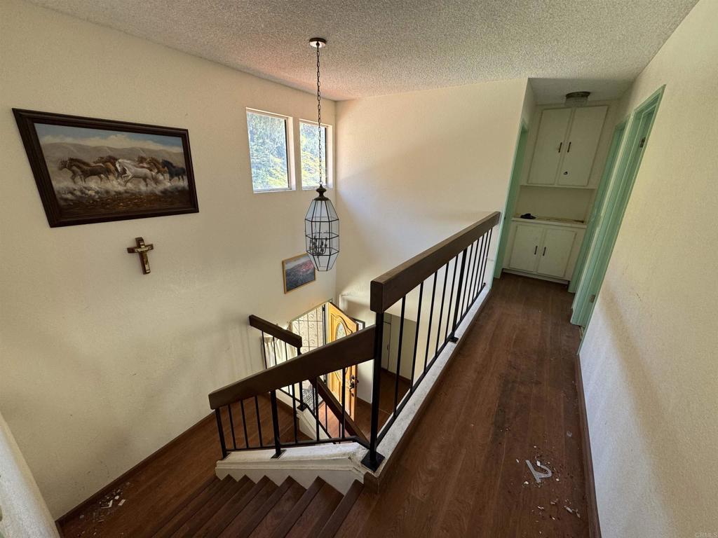 2845 Cottingham Street Oceanside, CA 92054 - Photo 6 of 11 a view of entryway with wooden floor