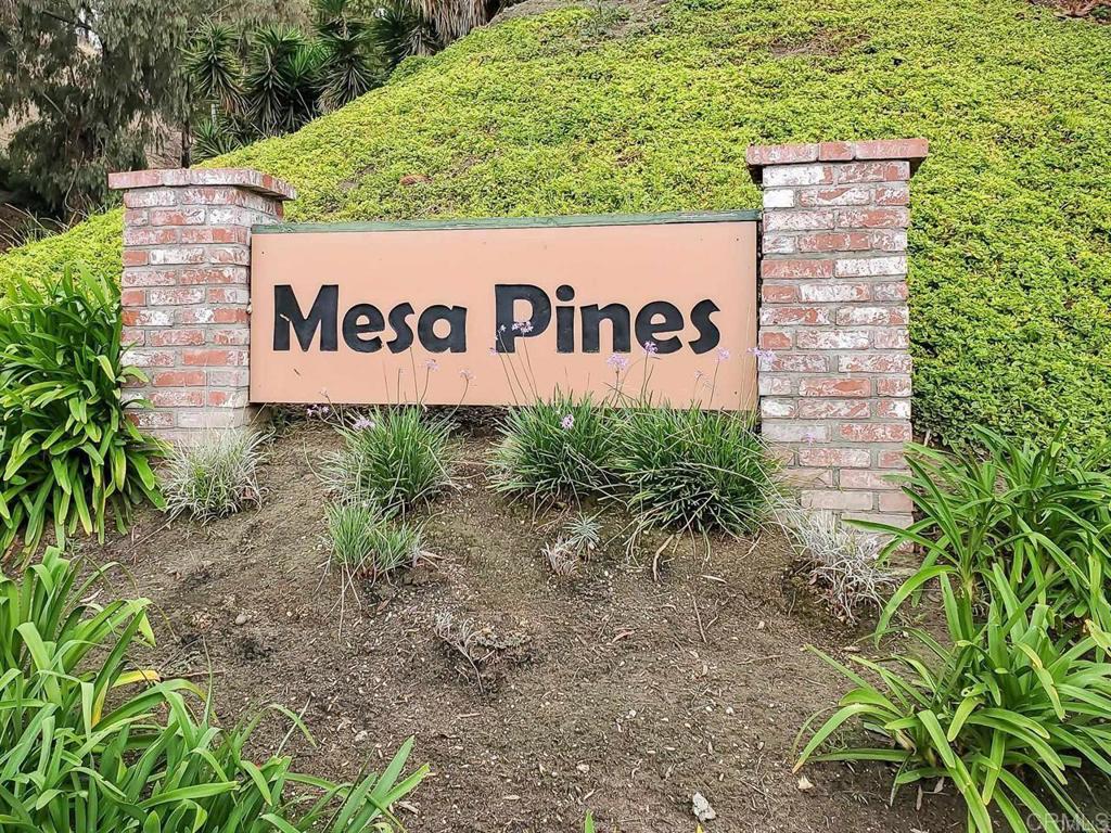 2845 Cottingham Street Oceanside, CA 92054 - Photo 9 of 11 a sign broad in front of red brick house