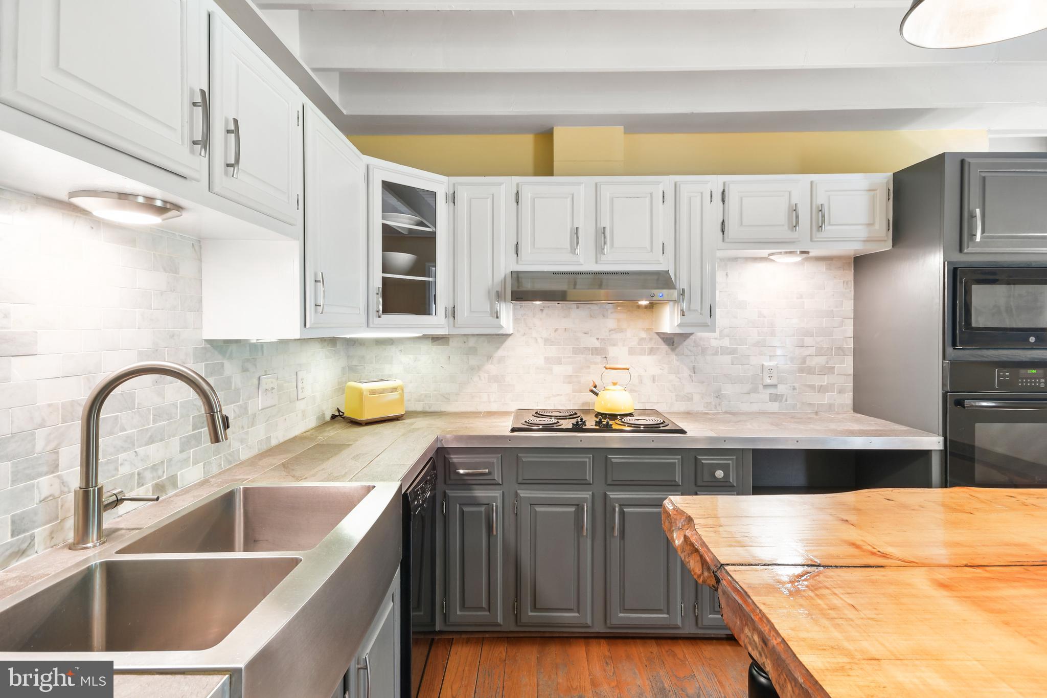 Farm sink, two-toned cabinets, and more!