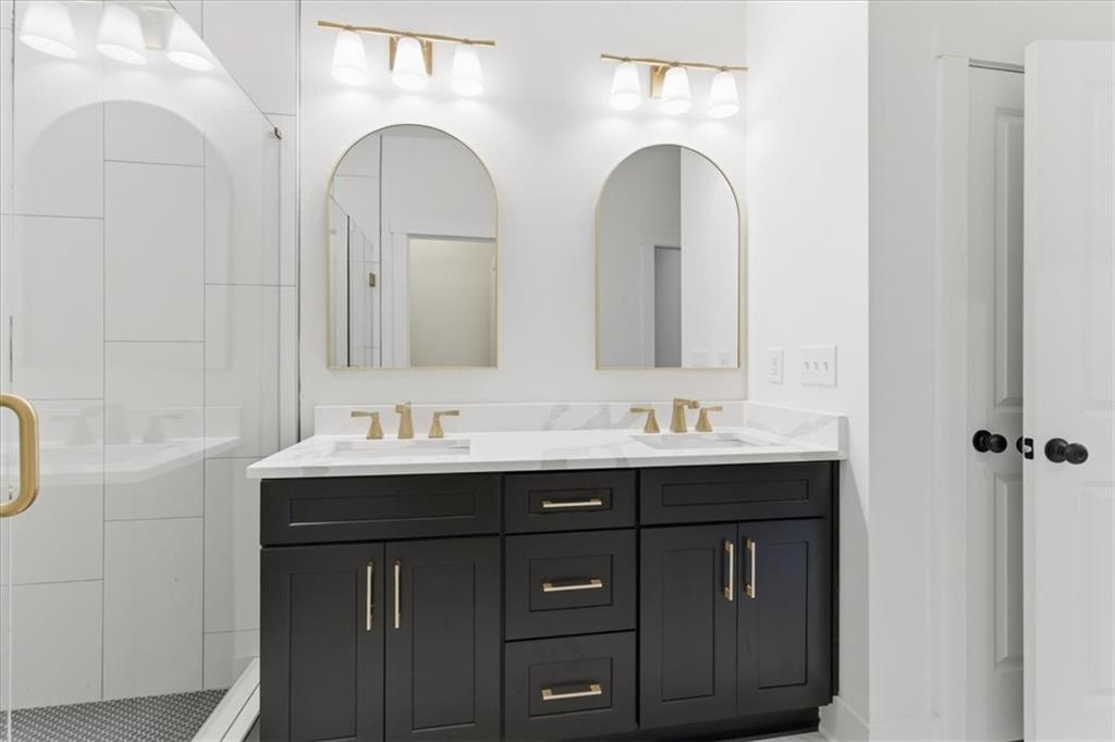 135 Old Alabama Road Southeast Emerson, GA 30137 - Photo 13 of 57 a bathroom with double vanity sinks and a mirror