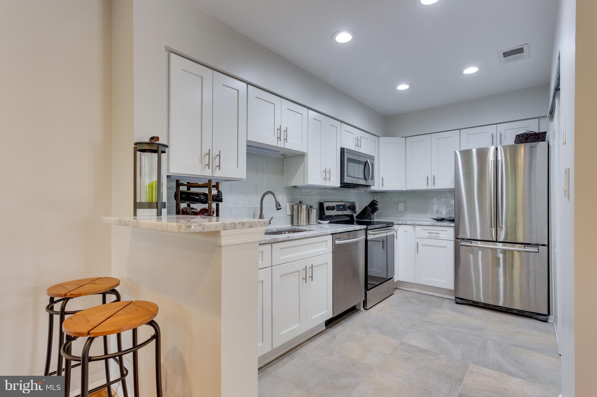 11178 Beaver Trail Court, Unit 11178 Reston, VA 20191 - Photo 9 of 24 All new appliances w/marble countertops