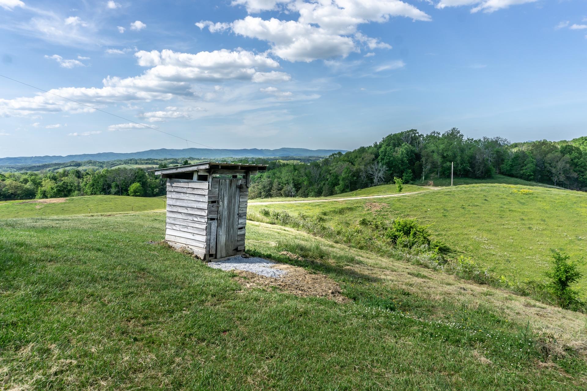 70 Collins Road Greeneville, TN 37745 - Photo 28 of 93 Working outhouse for bunkhouse