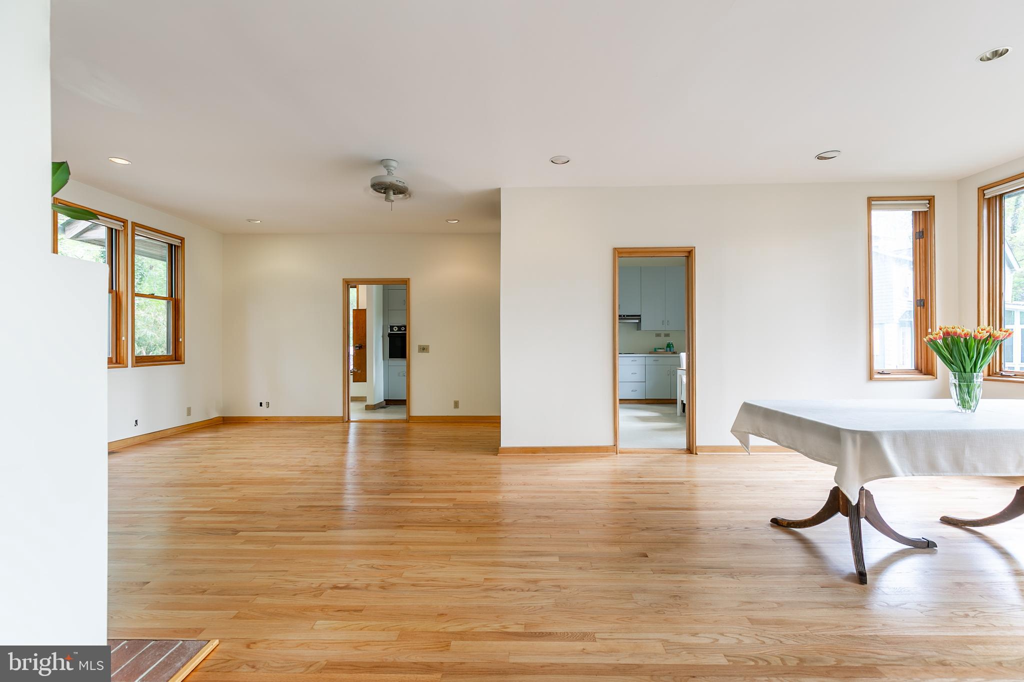 1432 Ravine Way Arnold, MD 21012 - Photo 7 of 50 Open LR/DR area with gleaming hdwd floors.