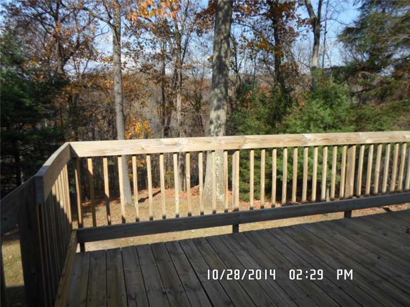 185 Ridge Road Freedom, PA 15042 - Photo 4 of 12 Exterior Back. deck and view of private rear yard.
