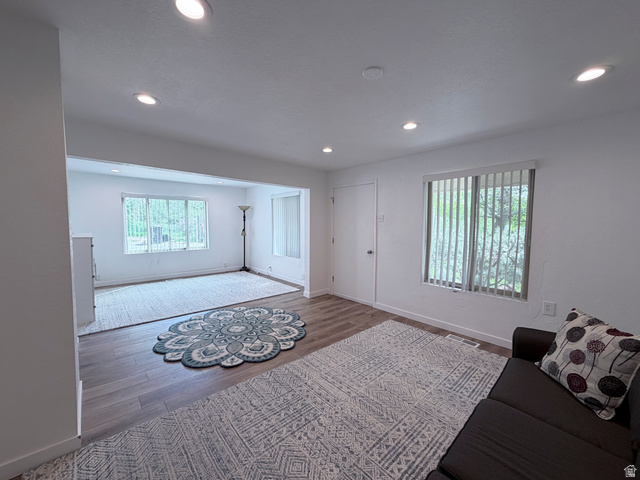 2855 South 1000 West Perry, UT 84302 - Photo 138 of 142 Living room with dark wood finished floors and recessed lighting