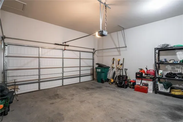 a view of an empty room with wooden walls