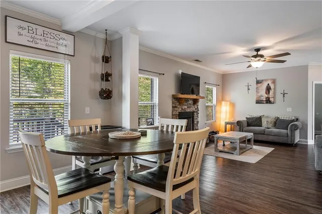 a view of balcony with wooden floor and fence