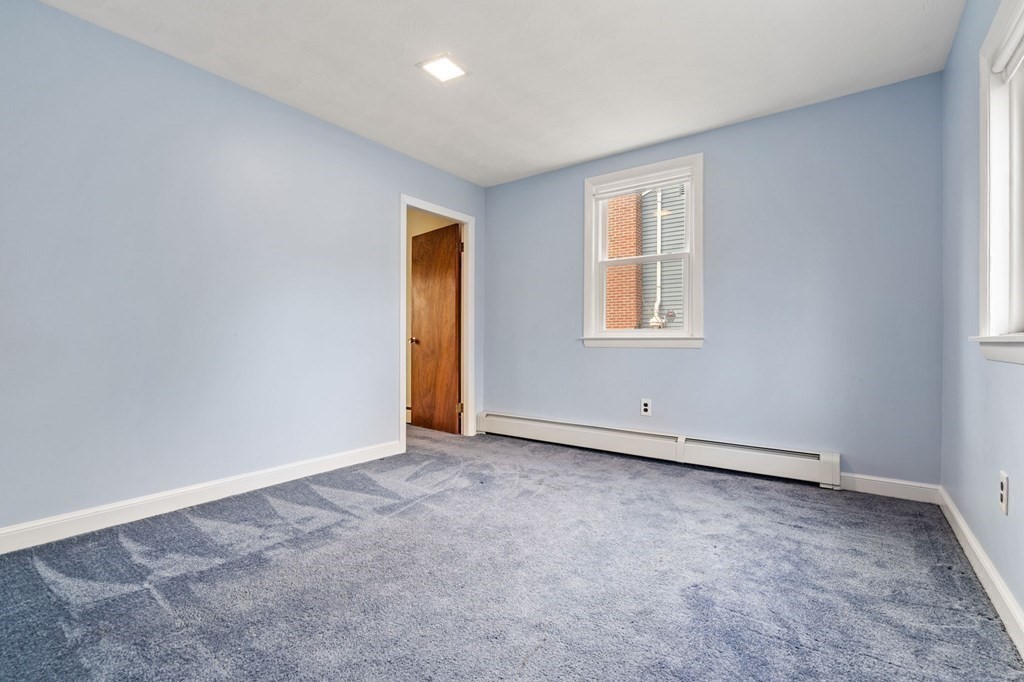 11 Christopher Drive Milton, MA 02186 - Photo 25 of 34 an empty room with a window