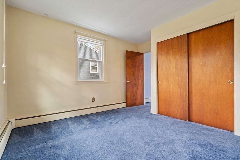 11 Christopher Drive Milton, MA 02186 - Photo 26 of 34 an empty room with windows