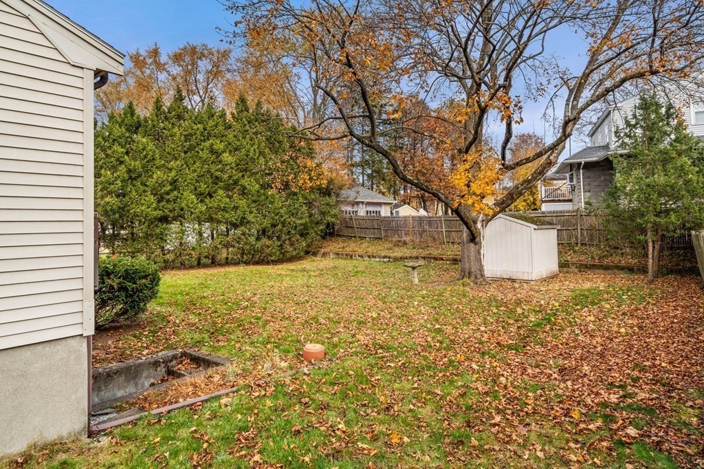 11 Christopher Drive Milton, MA 02186 - Photo 32 of 34 a view of a yard with plants and a trees