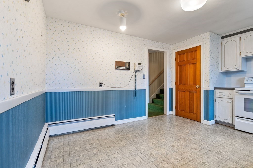 11 Christopher Drive Milton, MA 02186 - Photo 9 of 34 a view of an empty room with a kitchen