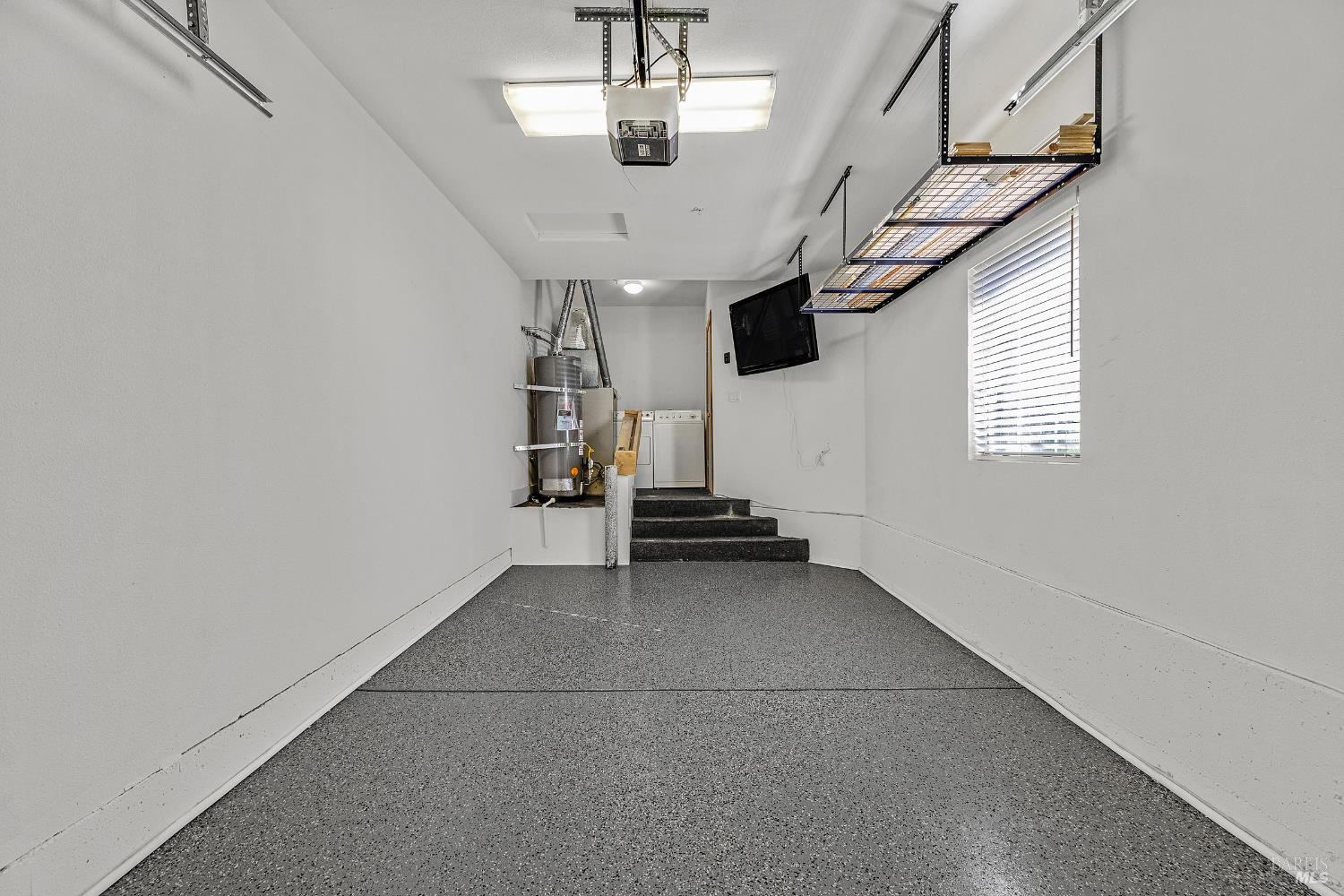 36 Bridle Path Lane Novato, CA 94945 - Photo 19 of 28 Finished garage with TV and side by side laundry