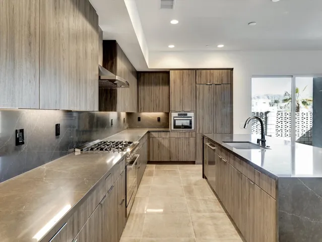 a bathroom with a shower and a sink
