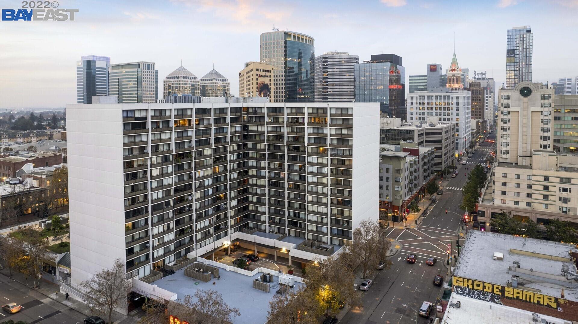 a view of a city with tall buildings