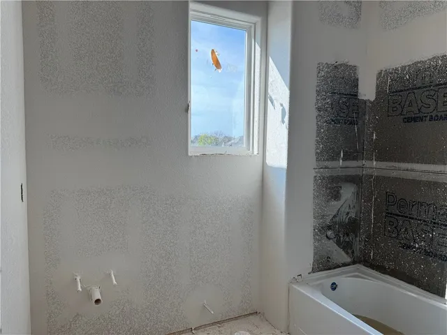 a bathroom with a bathtub