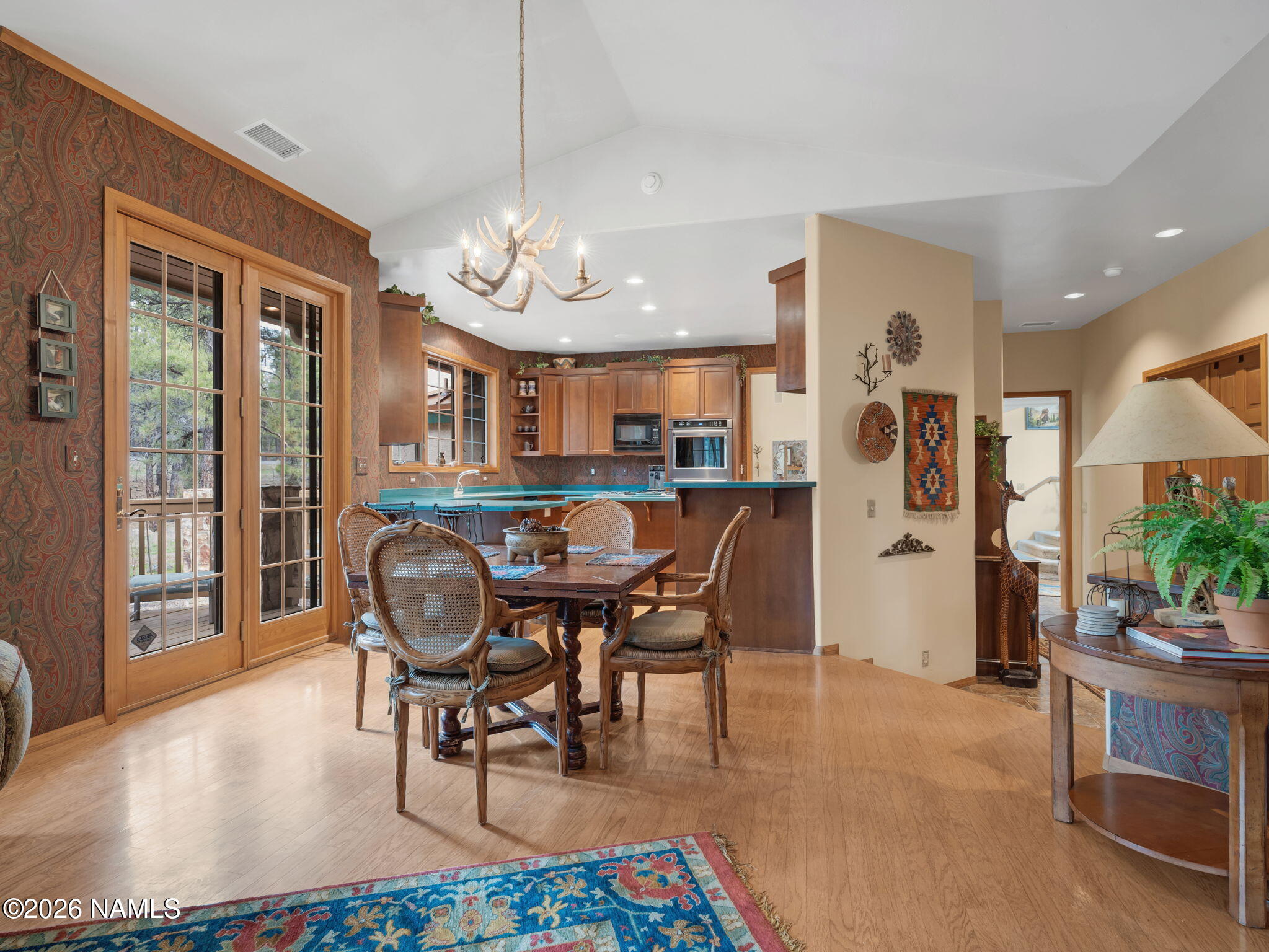 5415 North Fort Valley Road Flagstaff, AZ 86001 - Photo 12 of 64 a view of a dining room with furniture window and wooden floor