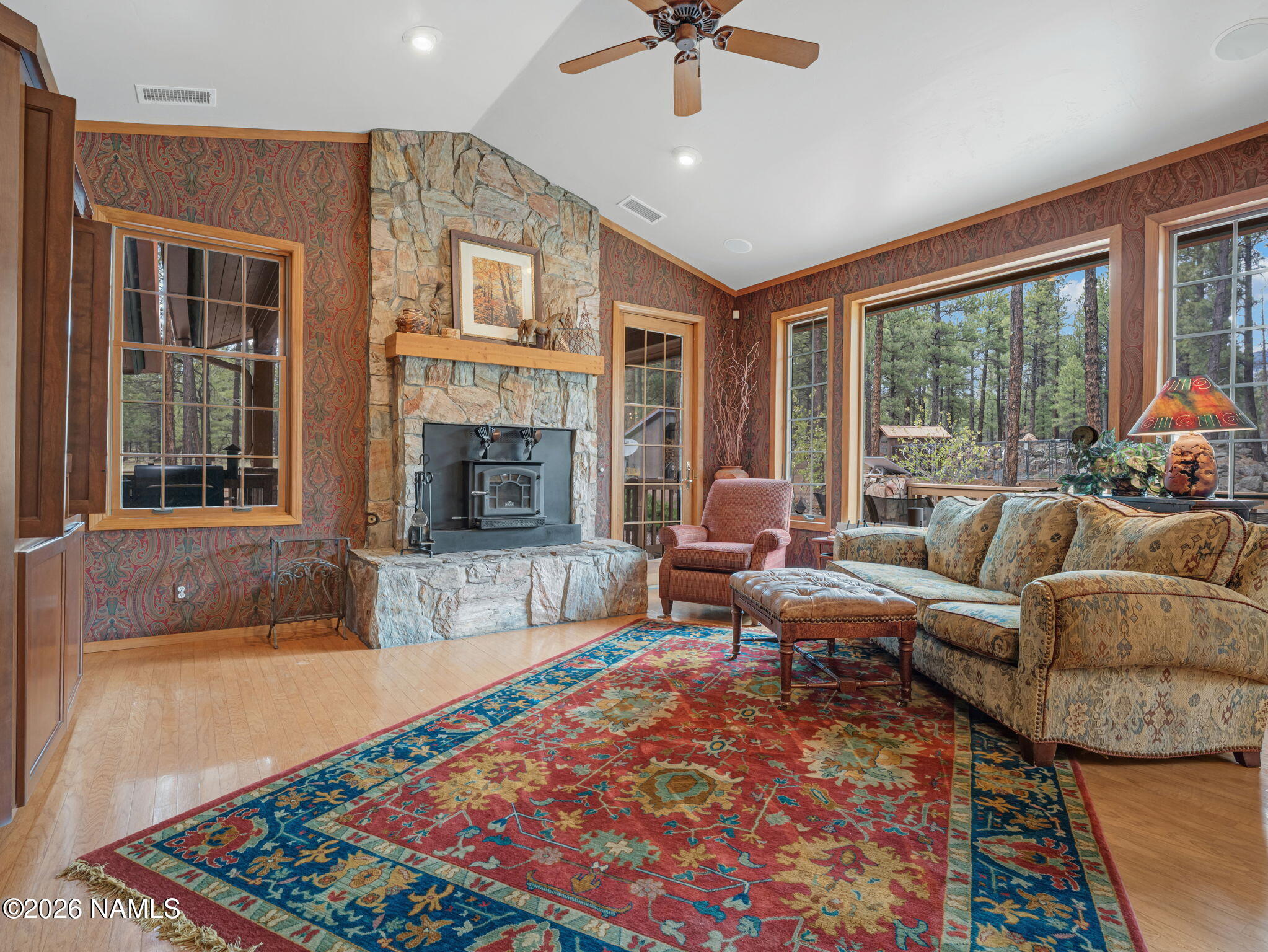 5415 North Fort Valley Road Flagstaff, AZ 86001 - Photo 13 of 64 a living room with furniture and a fireplace