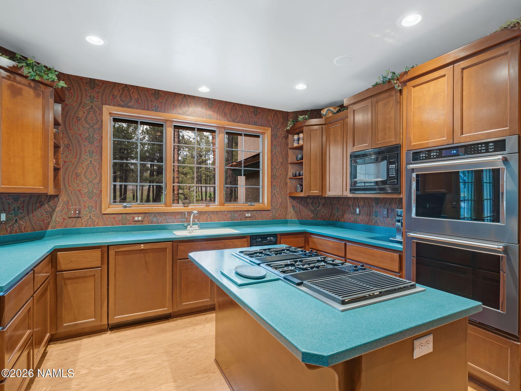 5415 North Fort Valley Road Flagstaff, AZ 86001 - Photo 16 of 64 a kitchen with stainless steel appliances granite countertop a stove and a sink