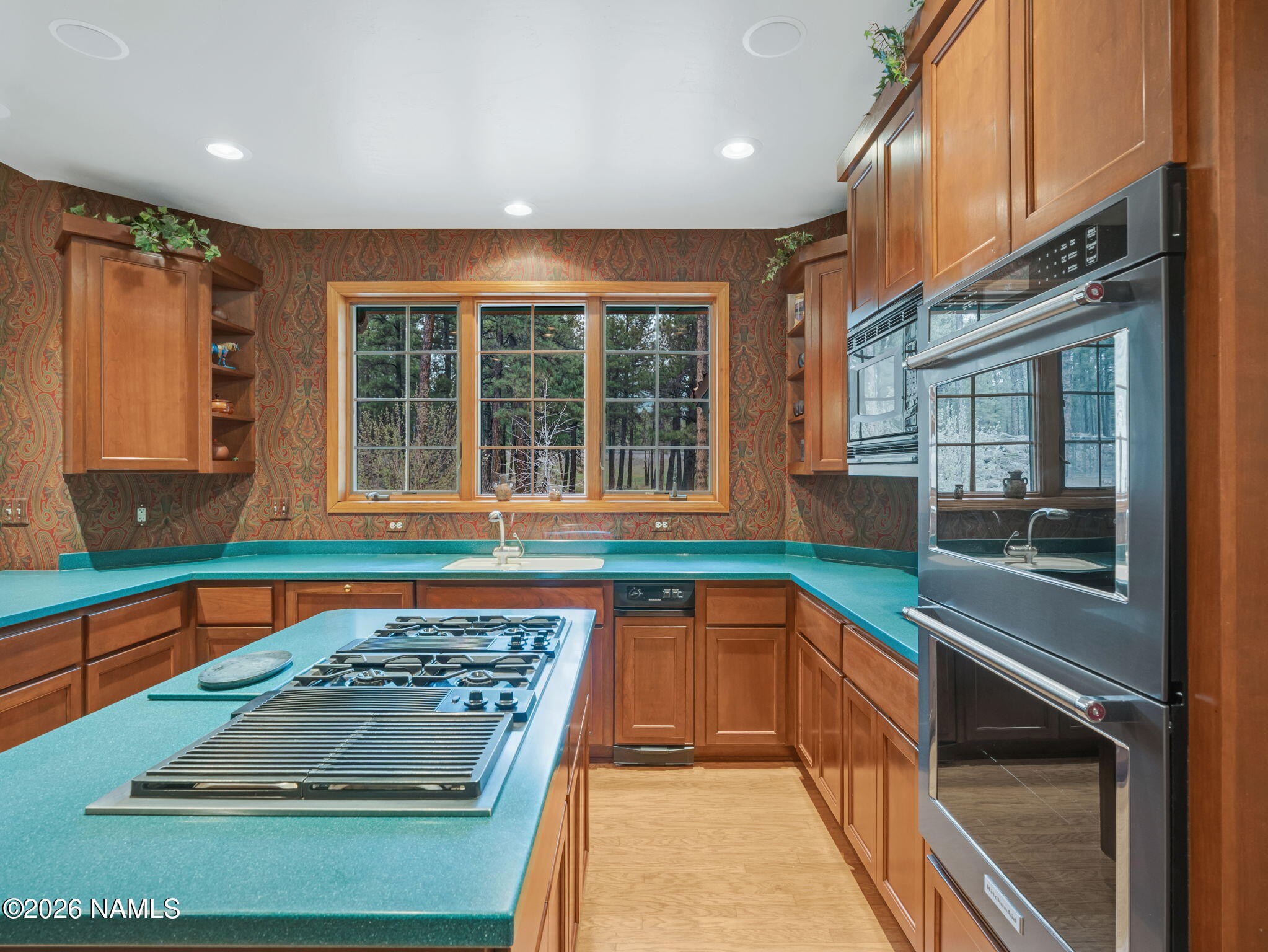 5415 North Fort Valley Road Flagstaff, AZ 86001 - Photo 17 of 64 a kitchen with a stove and a sink