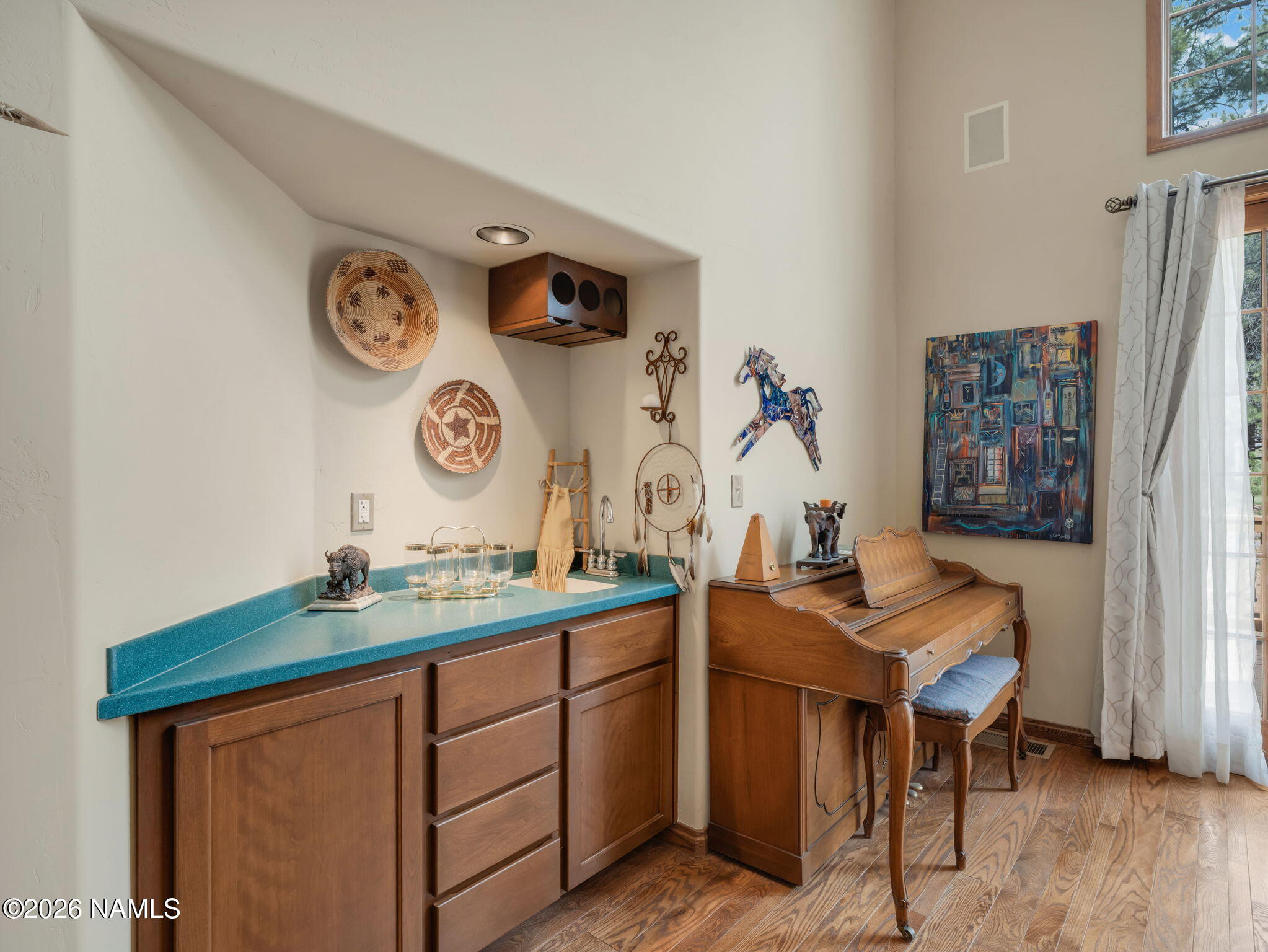 5415 North Fort Valley Road Flagstaff, AZ 86001 - Photo 24 of 64 a view of a workspace with furniture and wooden floor