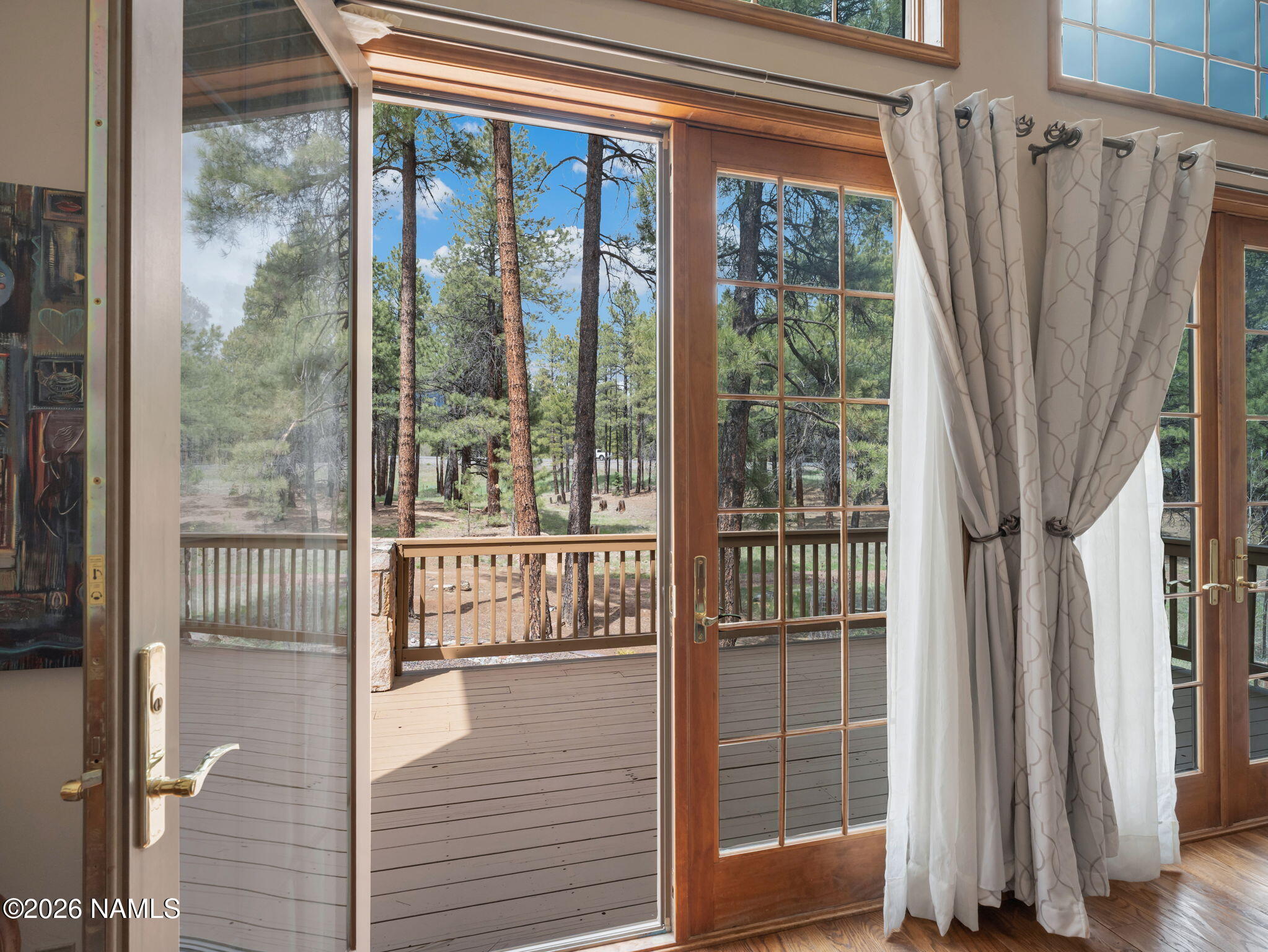 5415 North Fort Valley Road Flagstaff, AZ 86001 - Photo 25 of 64 a view of a balcony with wooden floor and outdoor space