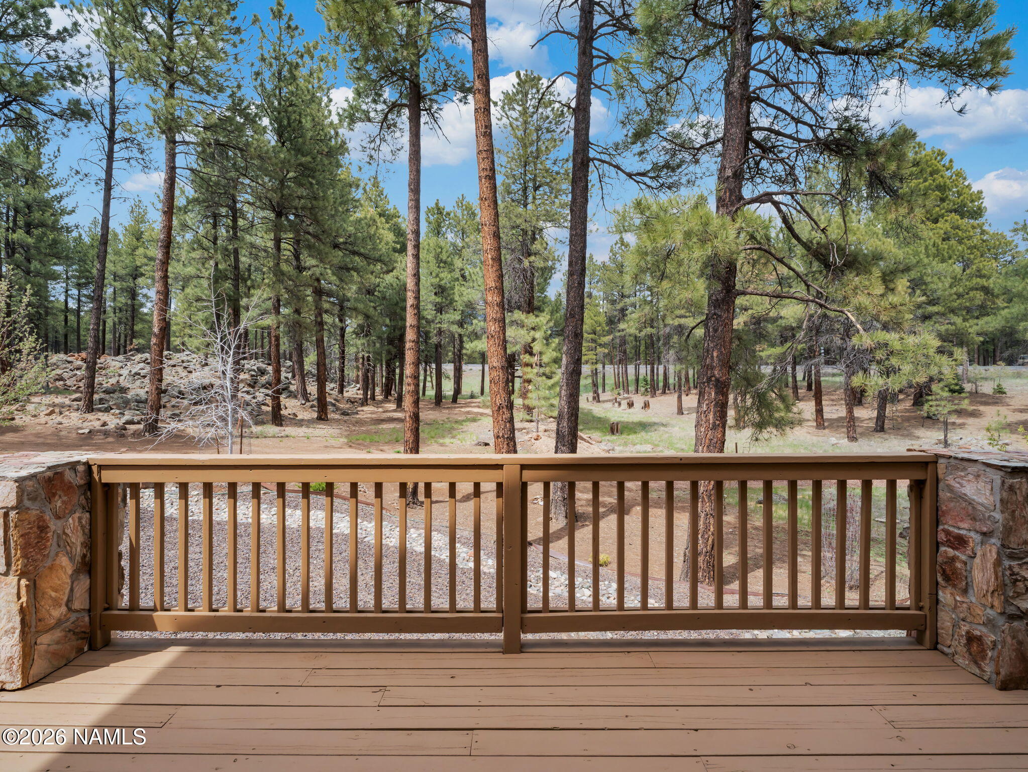 5415 North Fort Valley Road Flagstaff, AZ 86001 - Photo 26 of 64 a view of a wooden roof deck