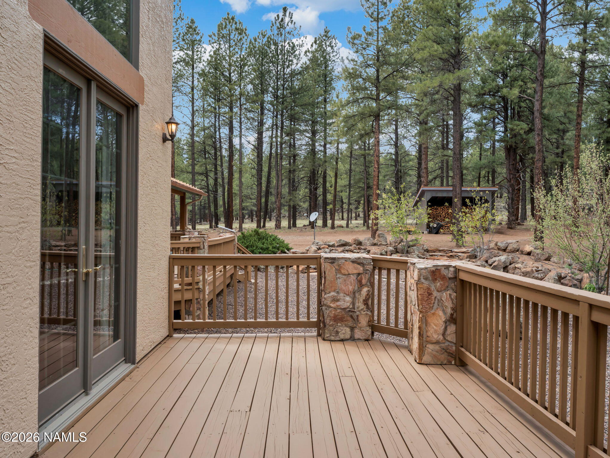 5415 North Fort Valley Road Flagstaff, AZ 86001 - Photo 27 of 64 a view of balcony with wooden floor and outdoor seating
