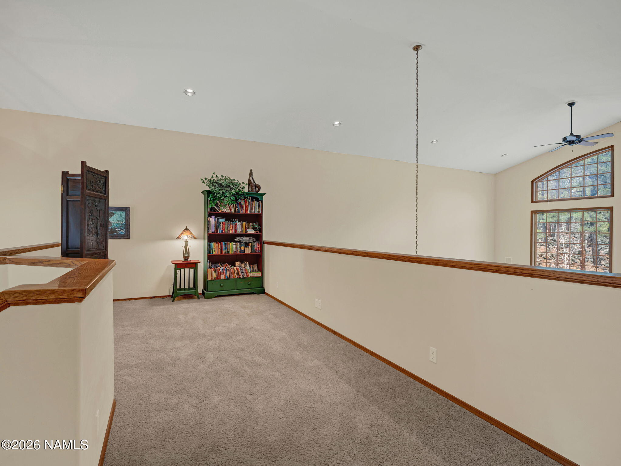 5415 North Fort Valley Road Flagstaff, AZ 86001 - Photo 48 of 64 a view of an empty room with furniture and a window
