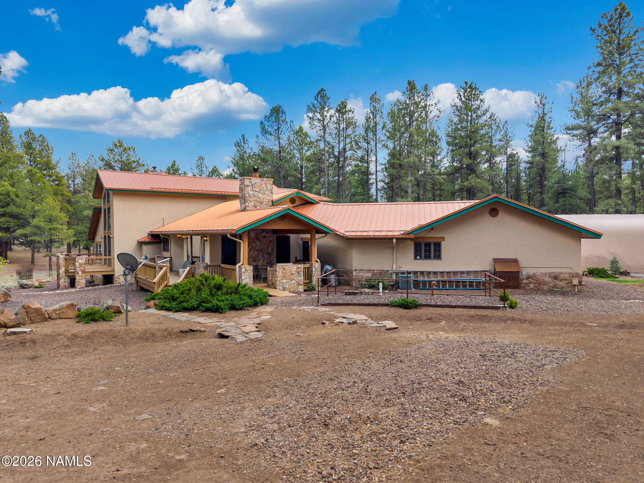 5415 North Fort Valley Road Flagstaff, AZ 86001 - Photo 53 of 64 a view of a house with a yard