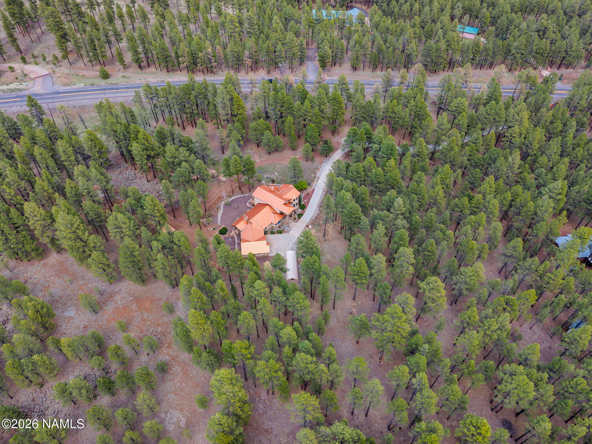 5415 North Fort Valley Road Flagstaff, AZ 86001 - Photo 58 of 64 a view of a lake with a house