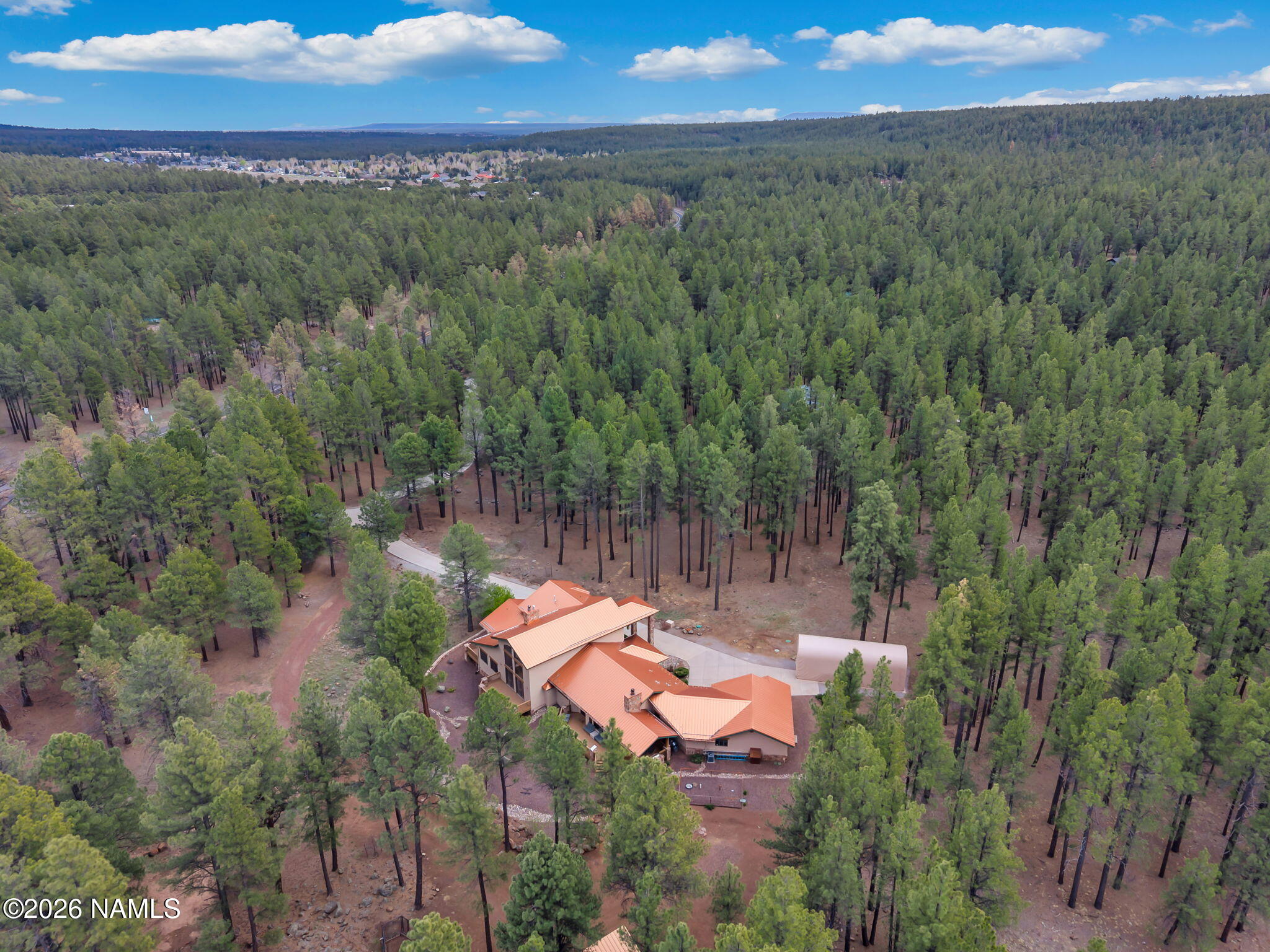 5415 North Fort Valley Road Flagstaff, AZ 86001 - Photo 60 of 64 an aerial view of a house with a yard