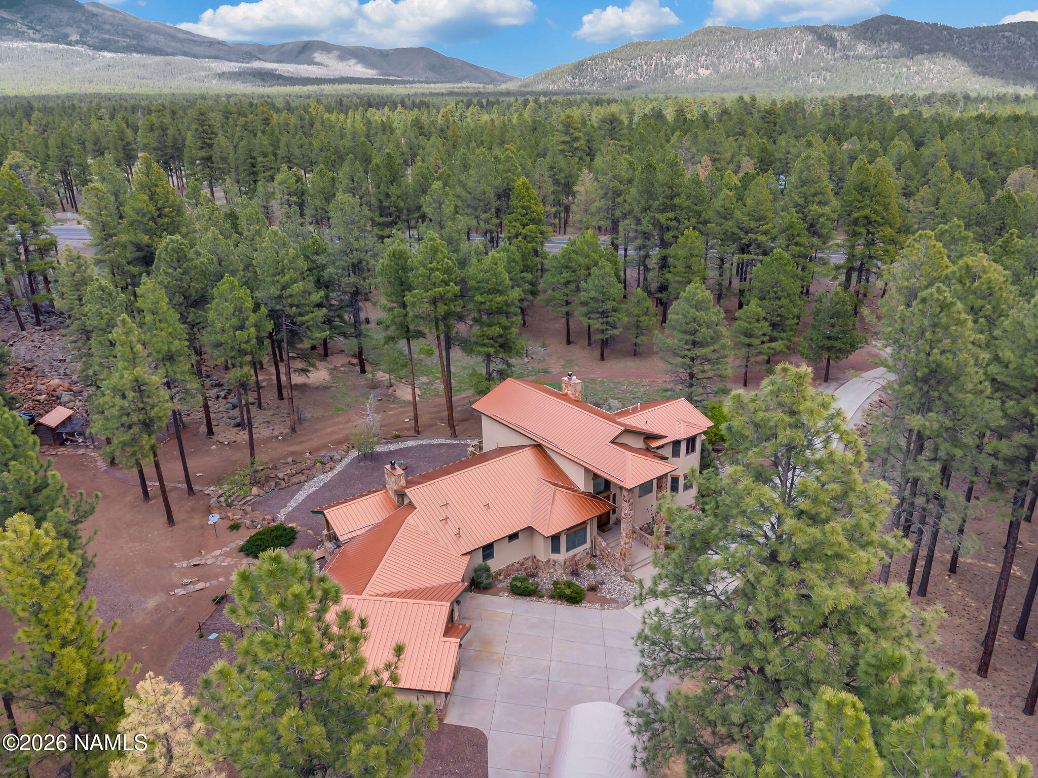 5415 North Fort Valley Road Flagstaff, AZ 86001 - Photo 62 of 64 an aerial view of a house with a yard
