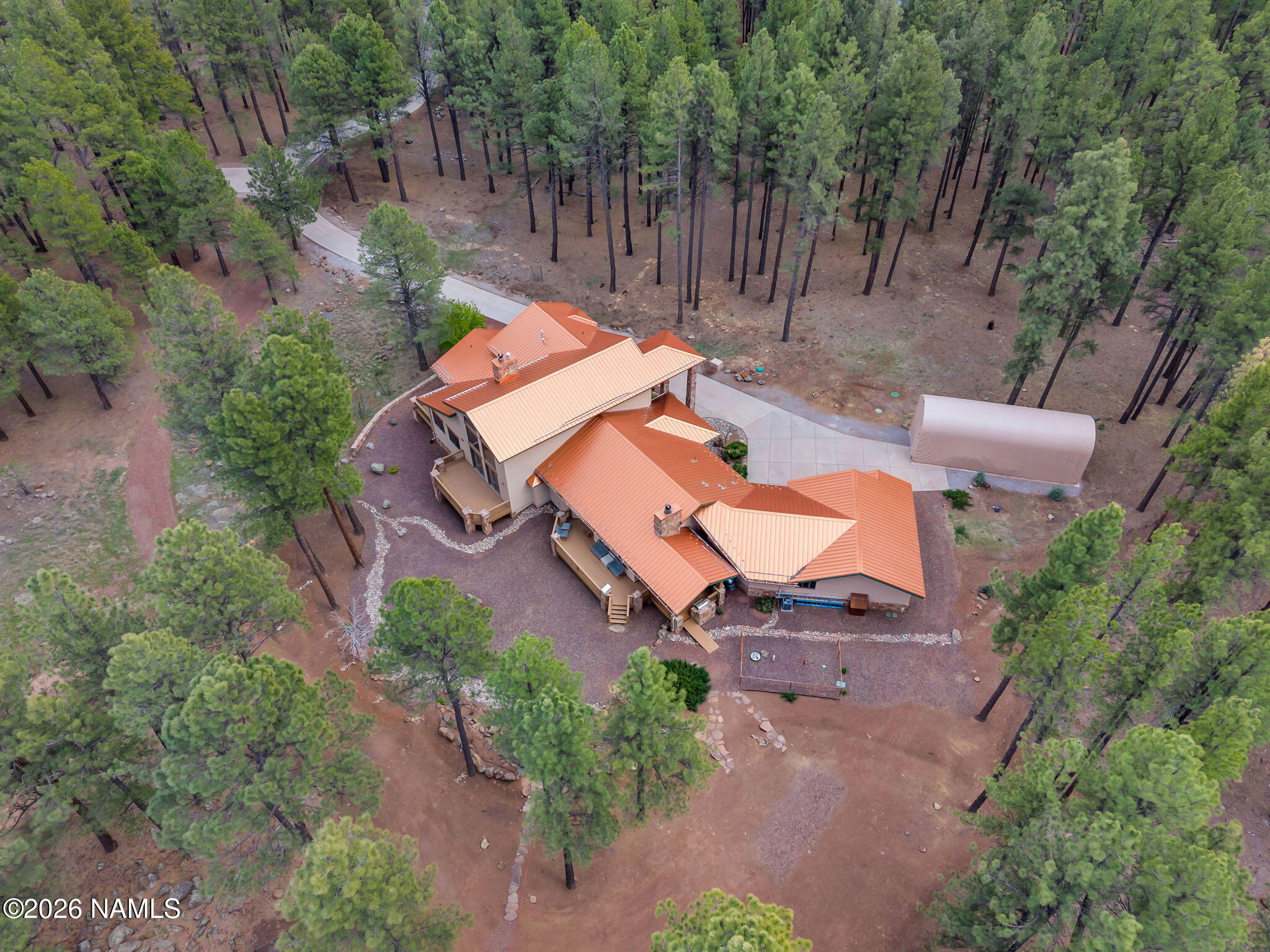 5415 North Fort Valley Road Flagstaff, AZ 86001 - Photo 63 of 64 an aerial view of a house with outdoor space and a garden
