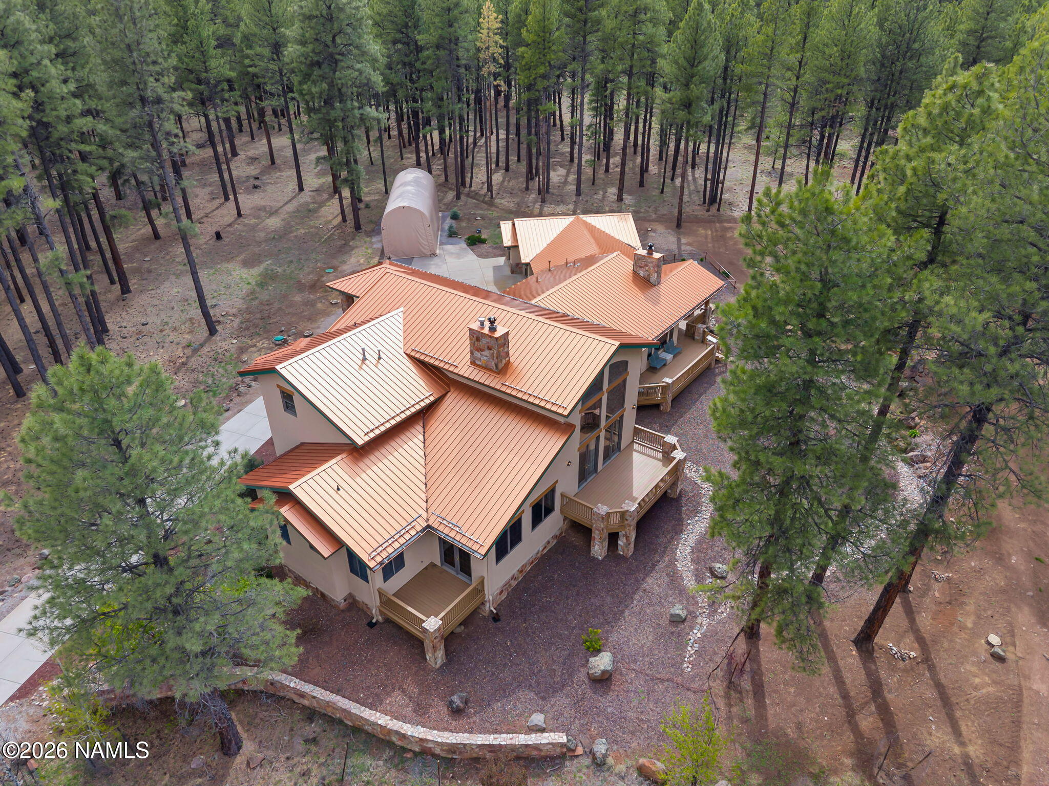 5415 North Fort Valley Road Flagstaff, AZ 86001 - Photo 64 of 64 an aerial view of a house with backyard space and balcony