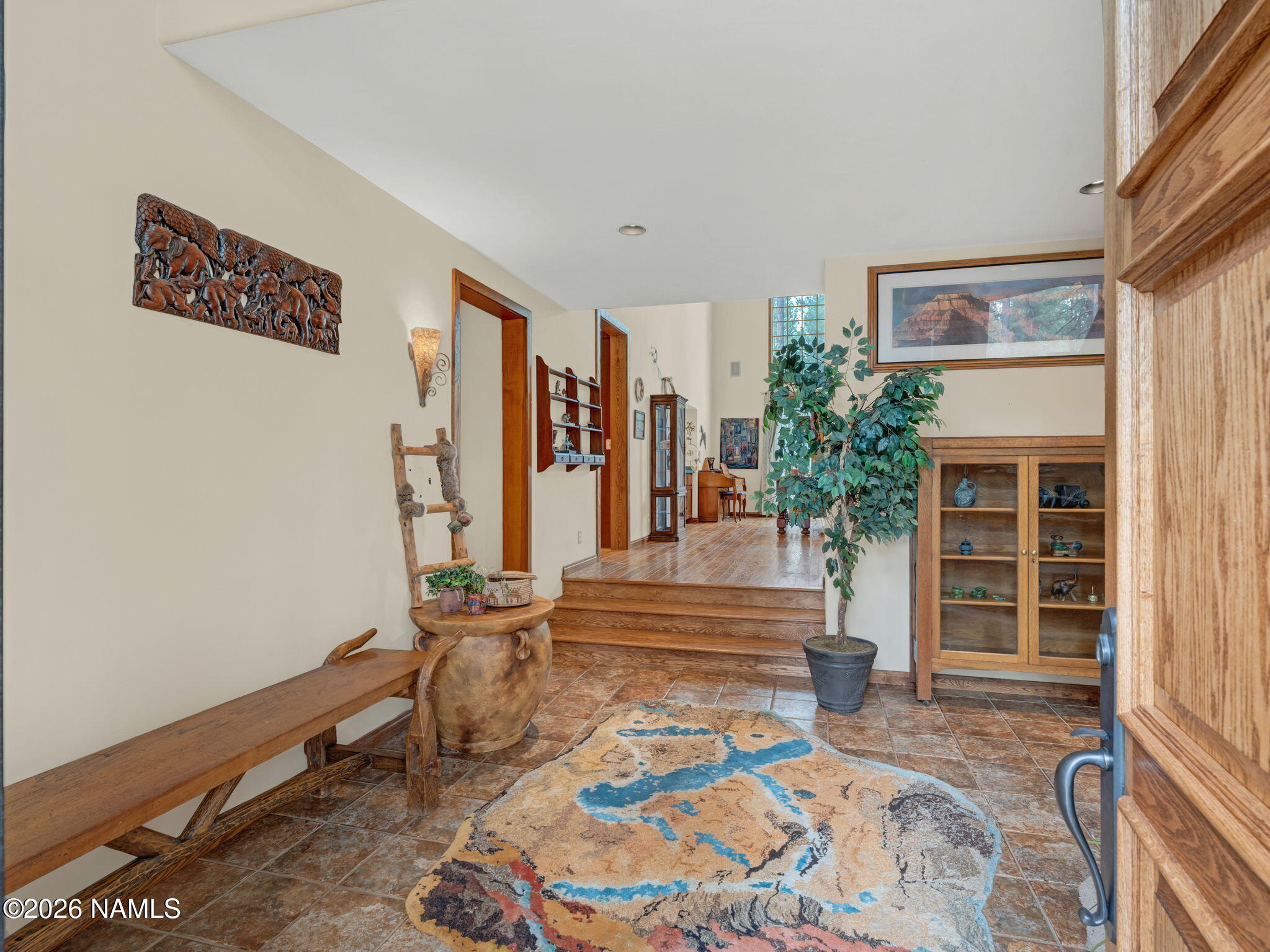 5415 North Fort Valley Road Flagstaff, AZ 86001 - Photo 8 of 64 a view of a livingroom with furniture and staircase