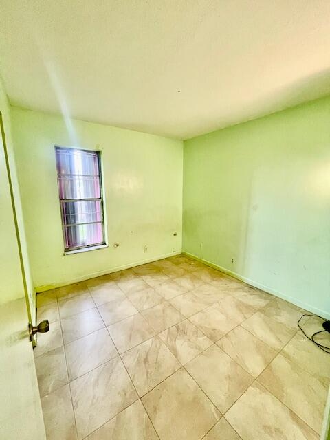 130 Mentone Road Boynton Beach, FL 33435 - Photo 20 of 26 a view of a room with window