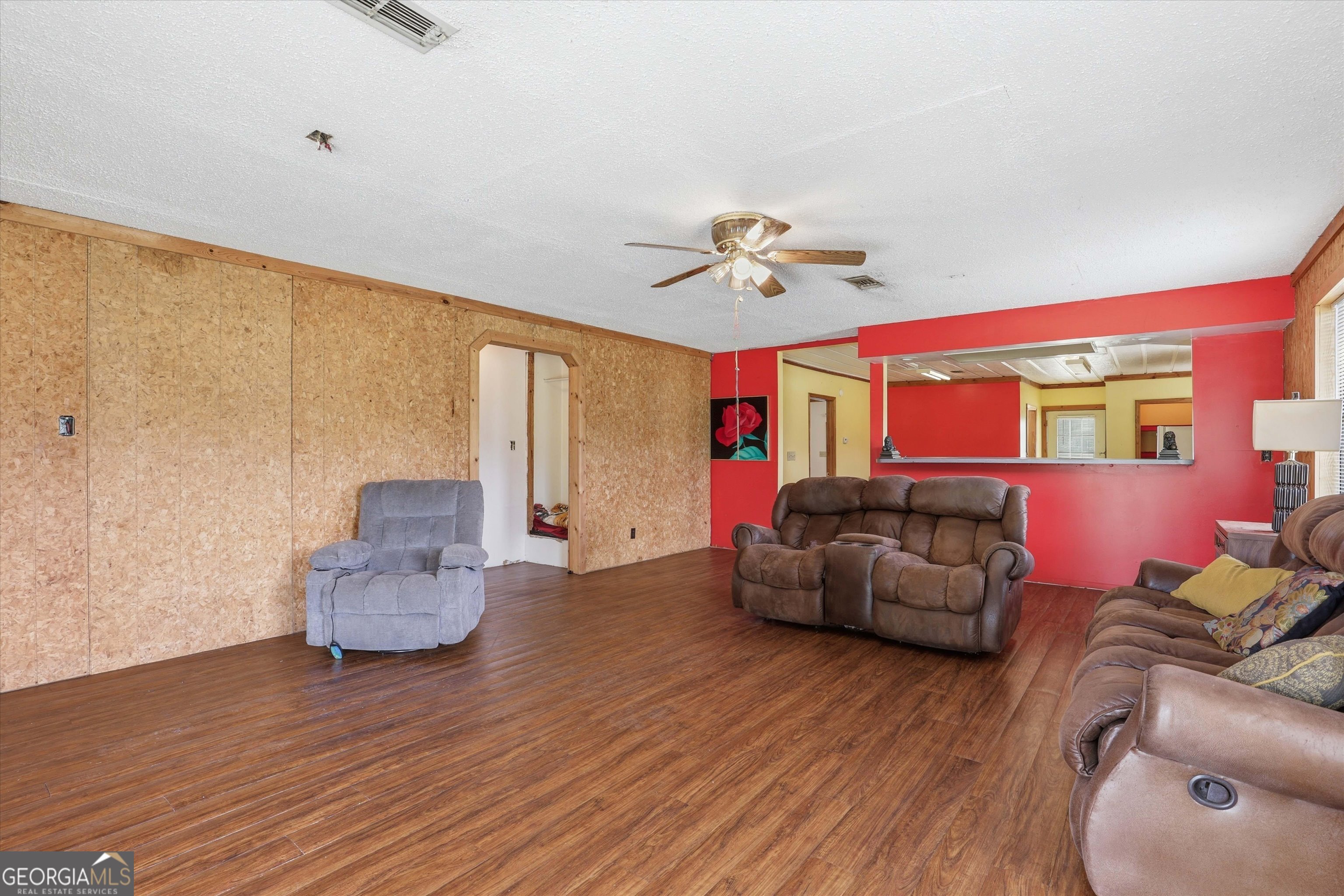 1525 Myron Hart Road Coolidge, GA 31738 - Photo 7 of 58 a living room with furniture and wooden floor