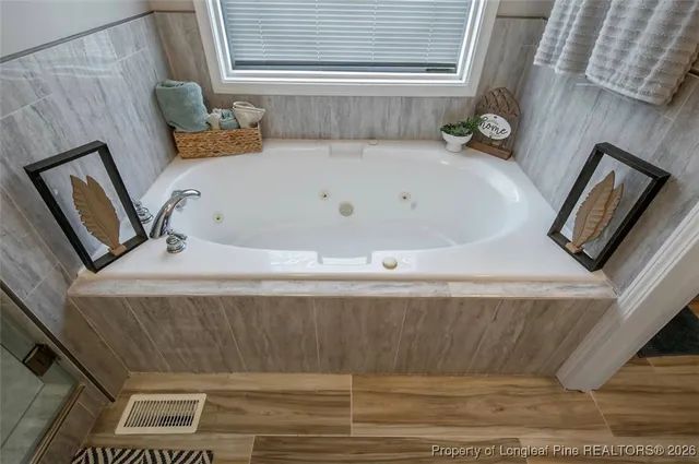 a bathroom with a bathtub