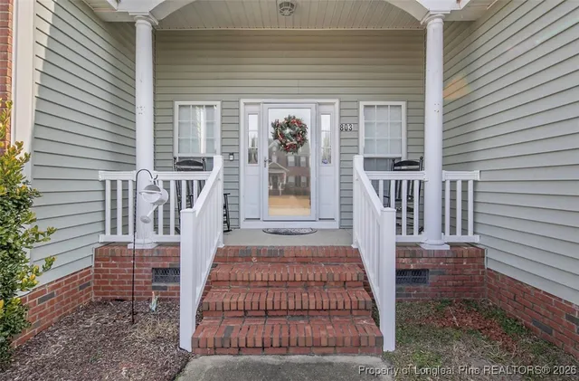 a view of a porch with a bench