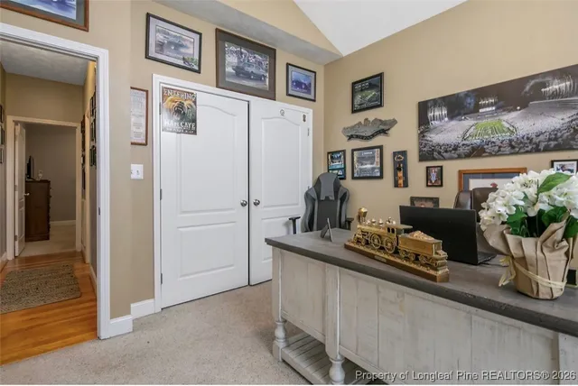 a kitchen with a refrigerator and sink