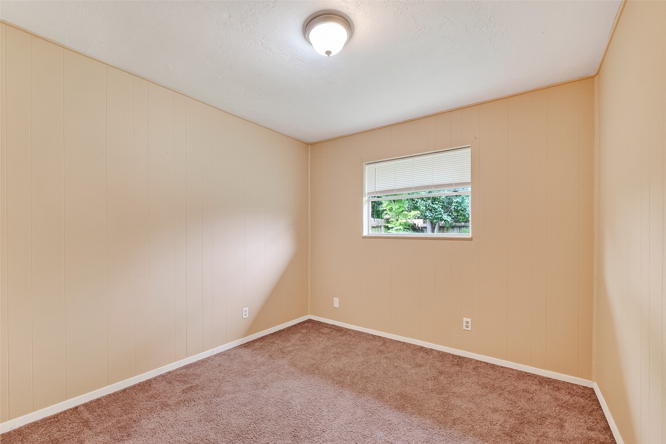 4826 Redfish Reef Drive Bacliff, TX 77518 - Photo 22 of 25 an empty room with a window