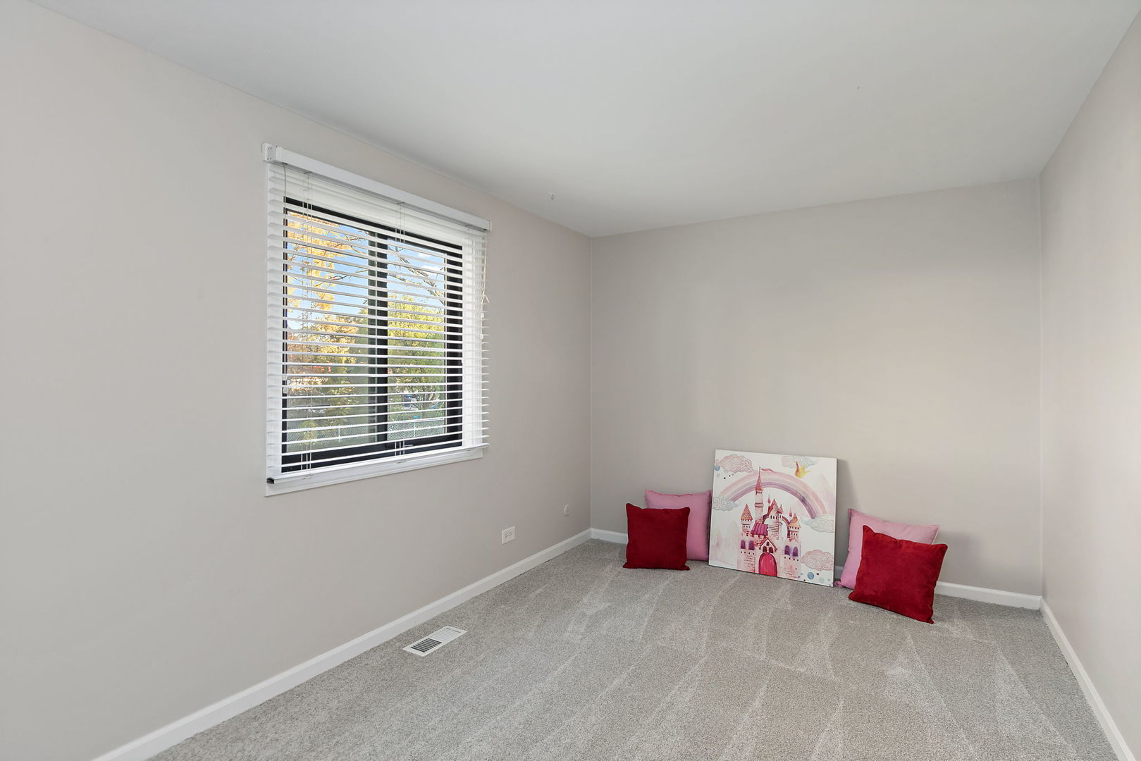 1303 Yarmouth Court, Unit 1303 Schaumburg, IL 60193 - Photo 8 of 11 a bedroom with a bed and cabinets