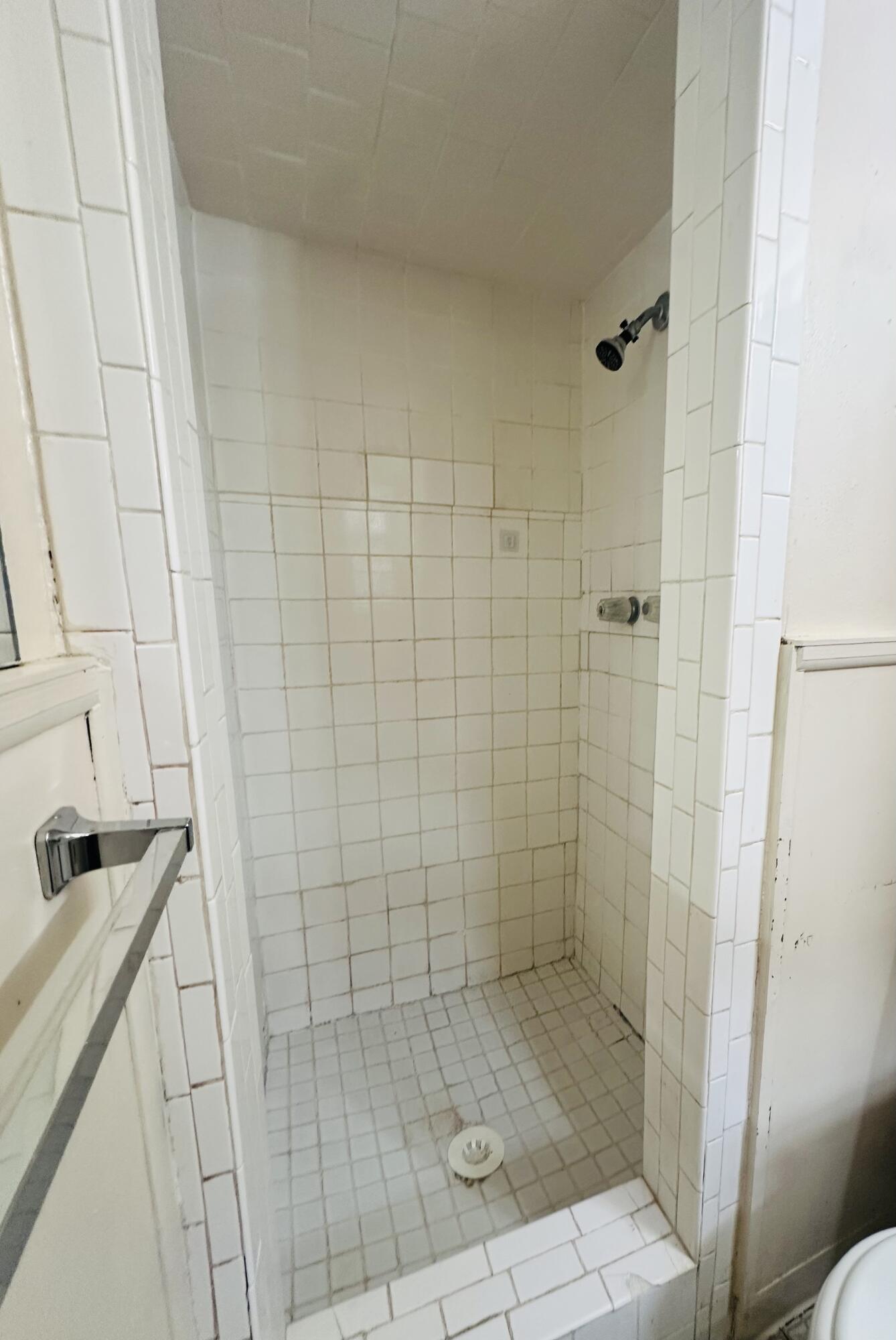 4918 14th Street Lubbock, TX 79416 - Photo 28 of 38 a bathroom with a shower