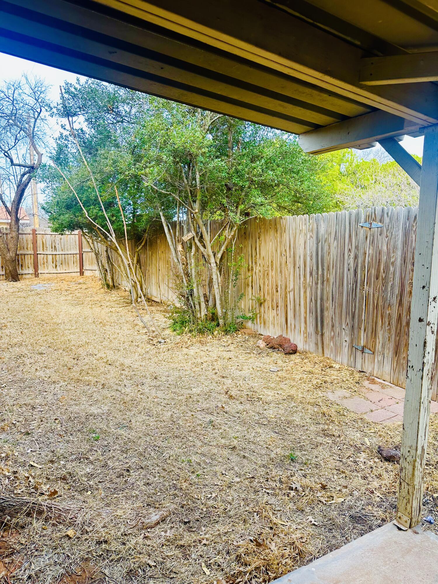 4918 14th Street Lubbock, TX 79416 - Photo 36 of 38 a view of a backyard of a house