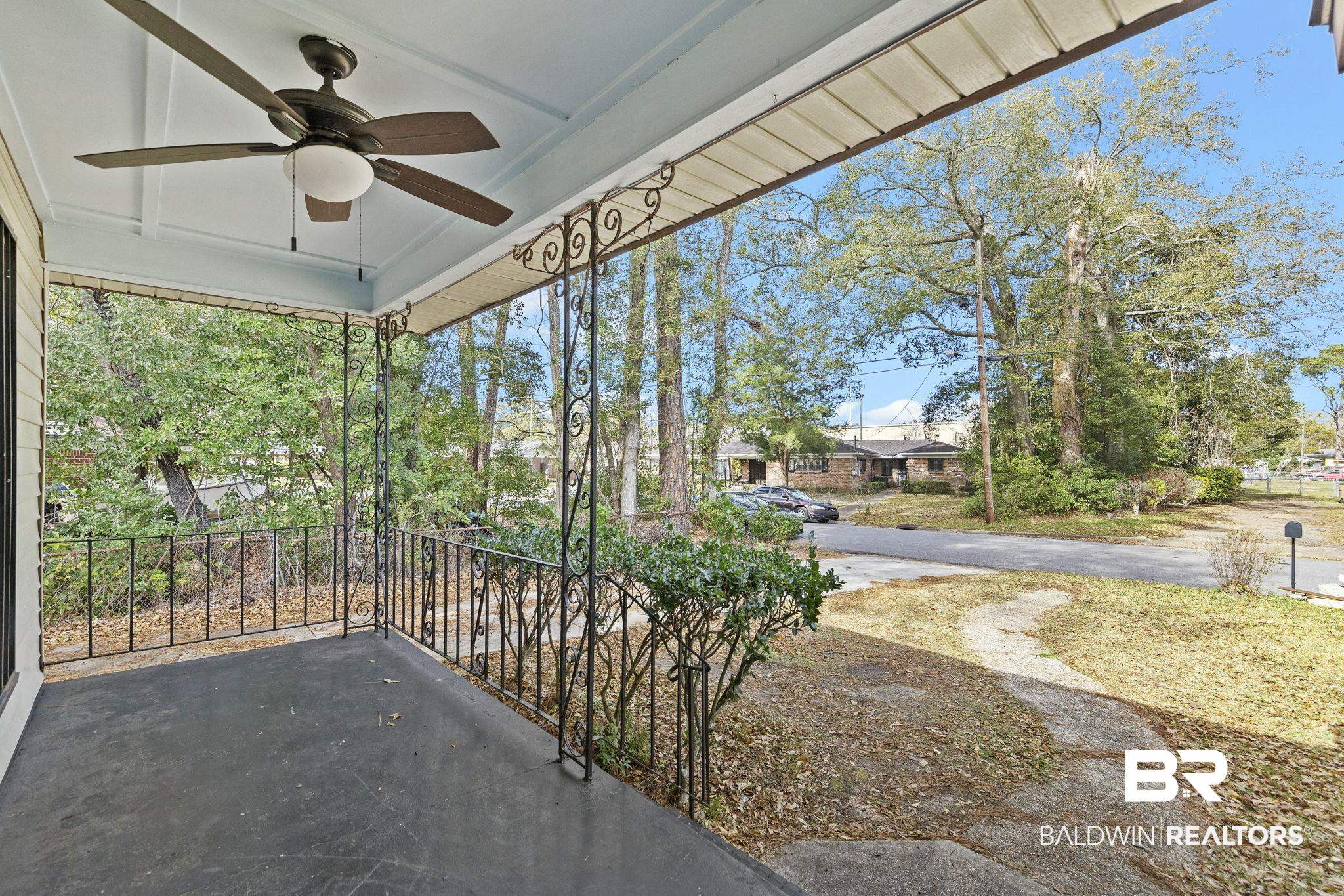 1665 Johnston Street Mobile, AL 36605 - Photo 3 of 17 View of patio featuring a porch and ceiling fan
