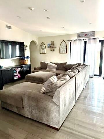 11178 Southwest 74th Terrace Miami, FL 33173 - Photo 5 of 18 a living room with furniture