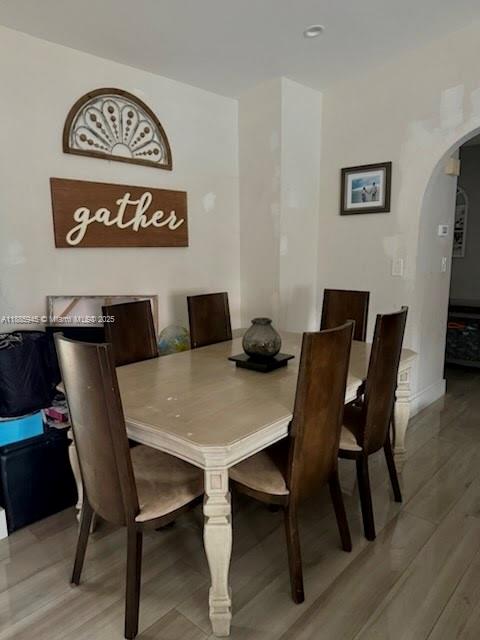11178 Southwest 74th Terrace Miami, FL 33173 - Photo 7 of 9 a view of a dining room with furniture and wooden floor